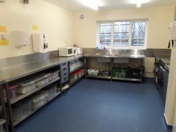 View of kitchen facing sink.