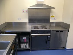 View of kitchen facing cooker.
