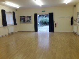 View of hall facing entrance.