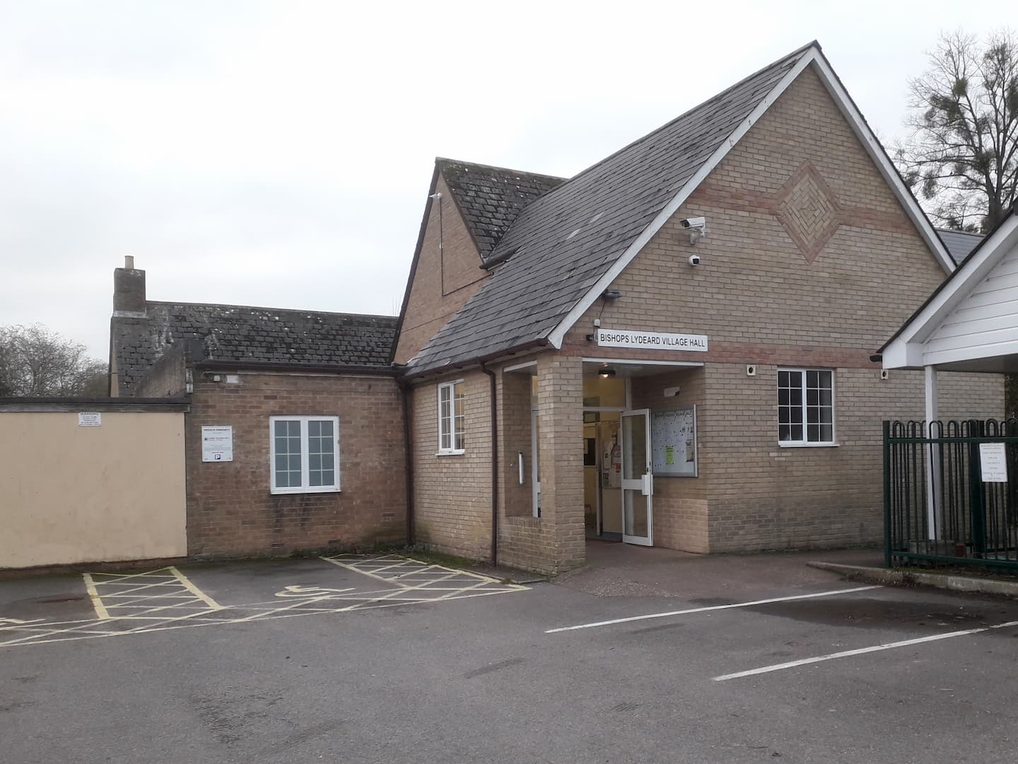 View of entrance to the village hall, including accessible parking.